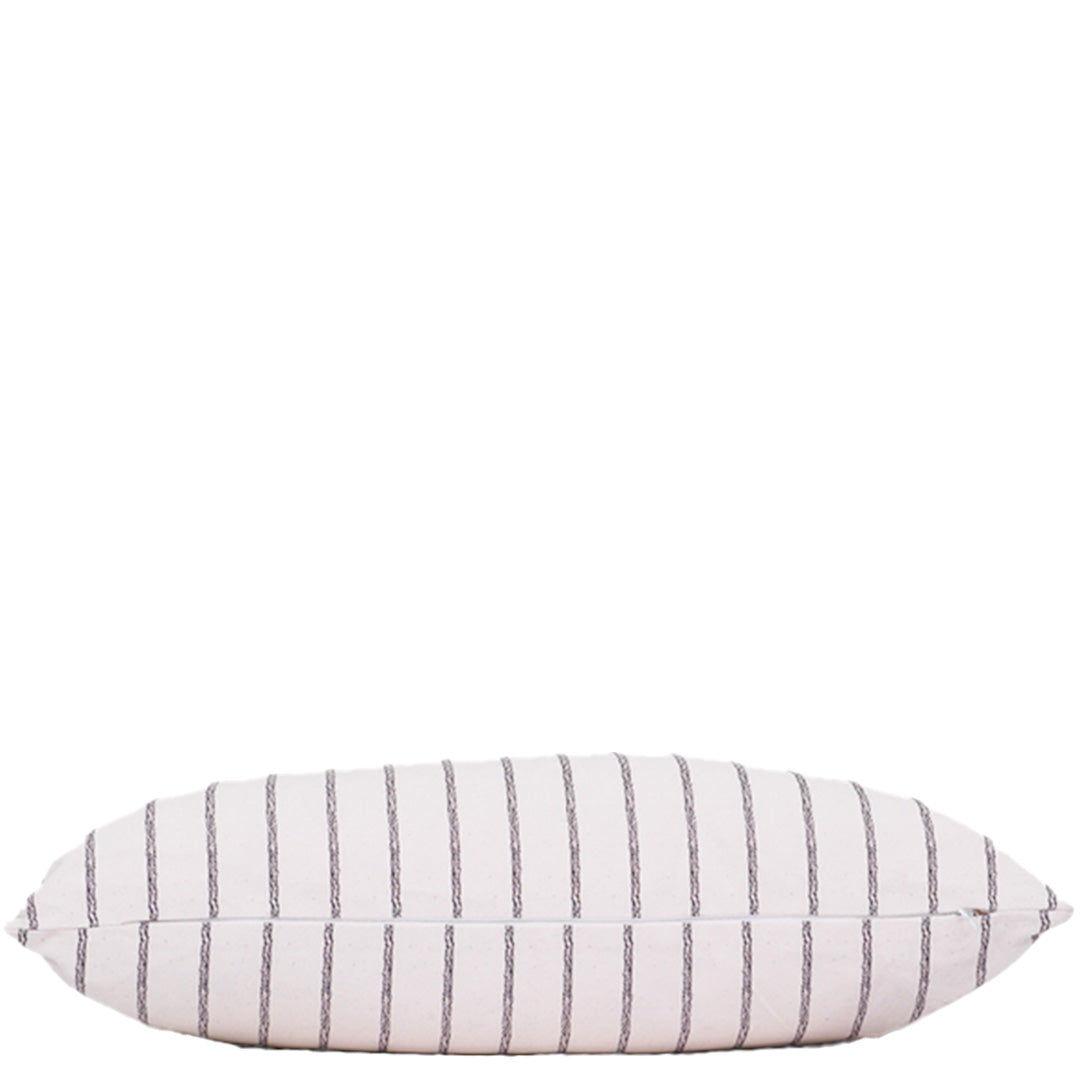 White pillow with thin gray stripes on a white background