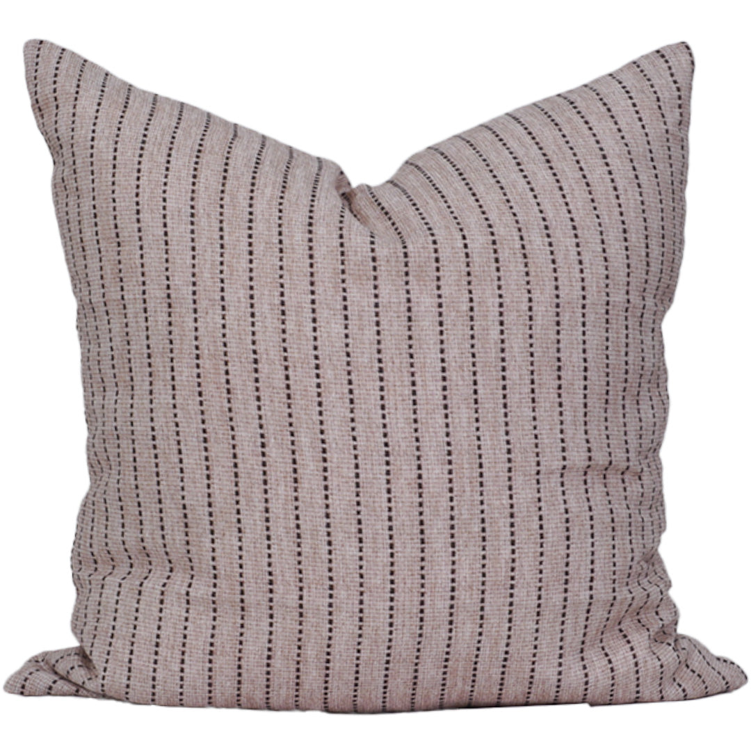 Striped pillow with a subtle pattern on a white background