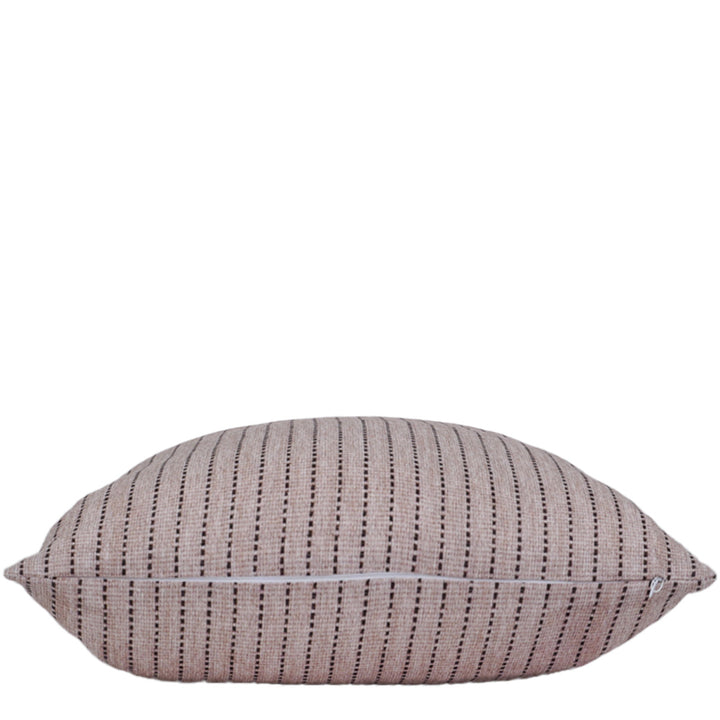 Striped pillow with a subtle pattern on a white background