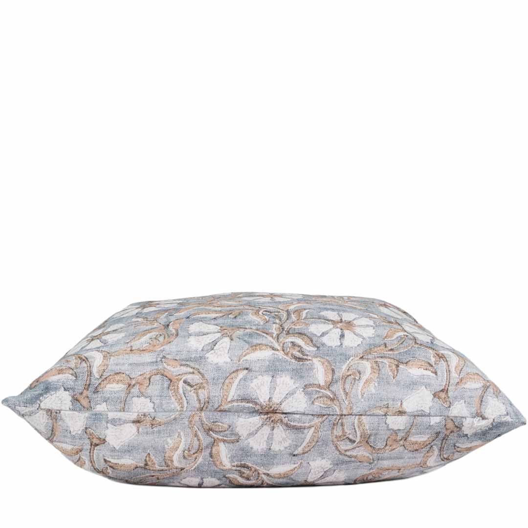 Decorative pillow with floral pattern on a white background