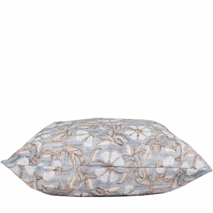 Decorative pillow with floral pattern on a white background