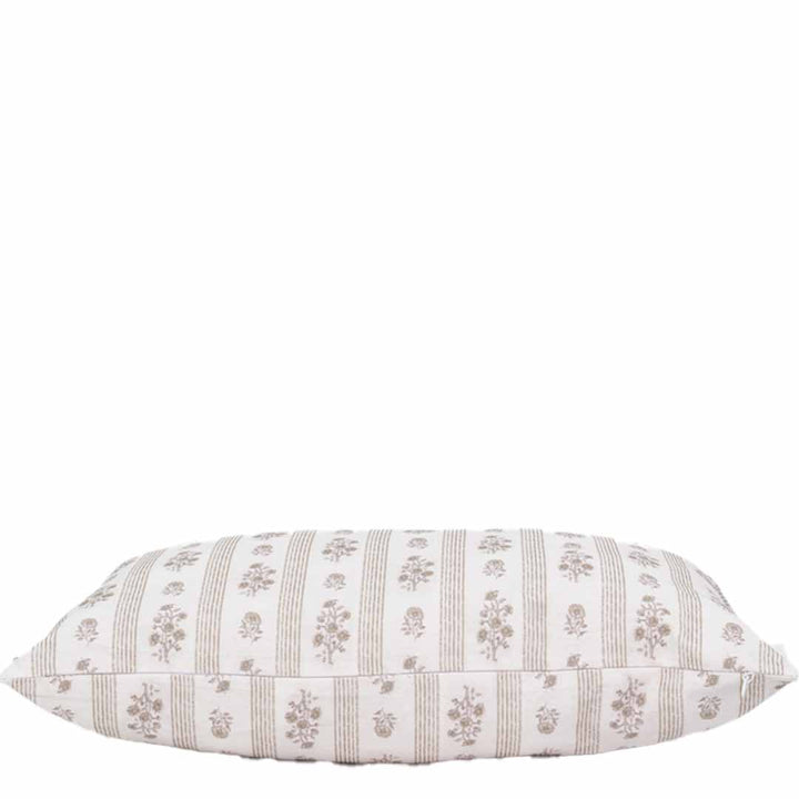 Decorative pillow with floral pattern on a white background