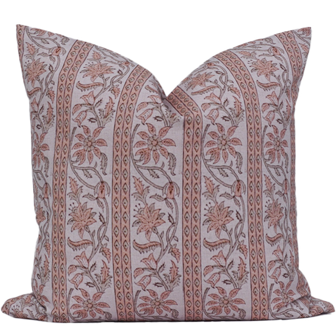 Decorative pillow with floral pattern on a white background