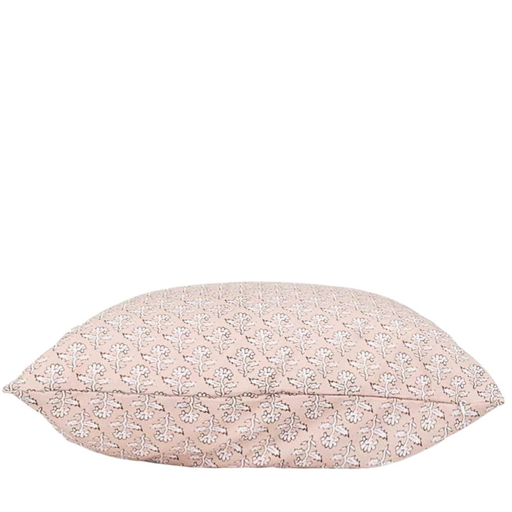 Floral-patterned pillow on a white background